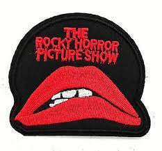 4 inches wide, a new Rocky Horror Picture Show Die-Cut Logo Embroidered Patch. Sew or iron on. New.
Please note we will always combine shipping on like items. Any additional patch or pin will ship for 50 cent per item. Any additional payment will be reimbursed to your Paypal account. Thank You.
