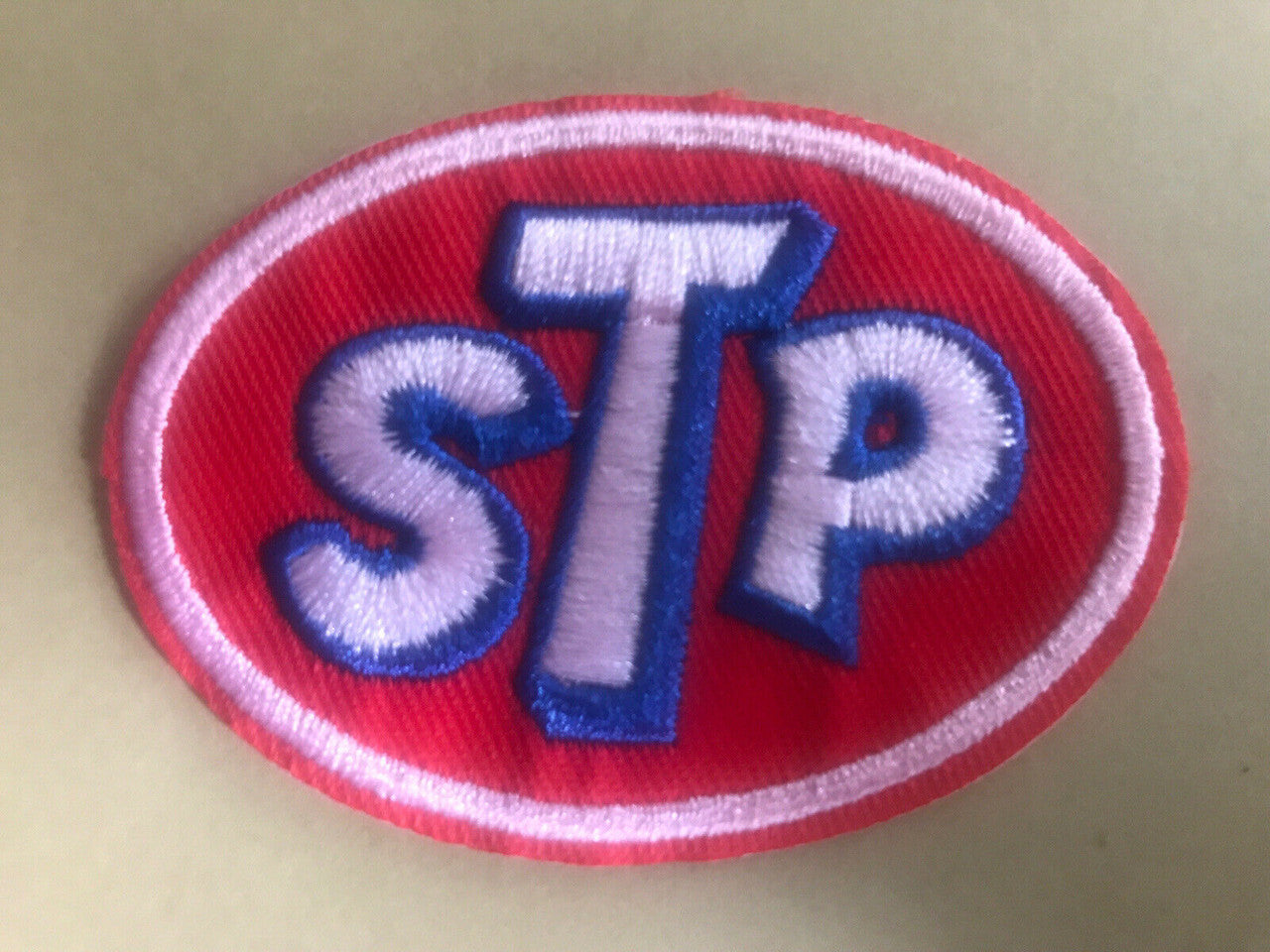 2 7/8 inches wide, a new STP Motor Oil Company Logo embroidered patch. Sew on or iron on. New.
Please note we will always combine shipping on like items. Any additional patch or pin will ship for 50 cent per item. Any additional payment will be reimbursed to your Paypal account. Thank You.