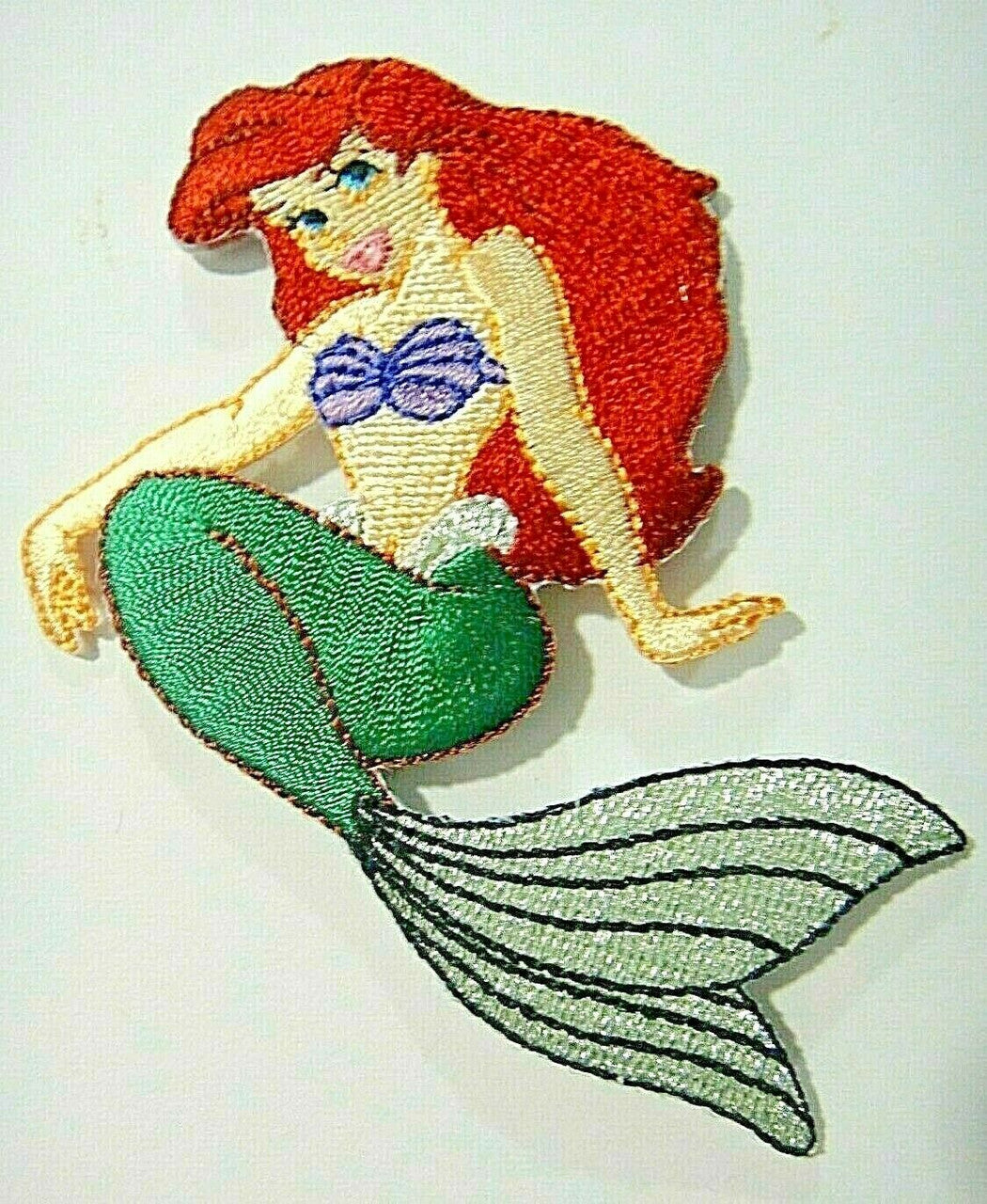 4 inches tall , a new Ariel the Little Mermaid embroidered patch. Sew on or iron on. New.
Please note we will always combine shipping on like items. Any additional patch or pin will ship for 50 cent per item. Any additional payment will be reimbursed to your Paypal account. Thank You.