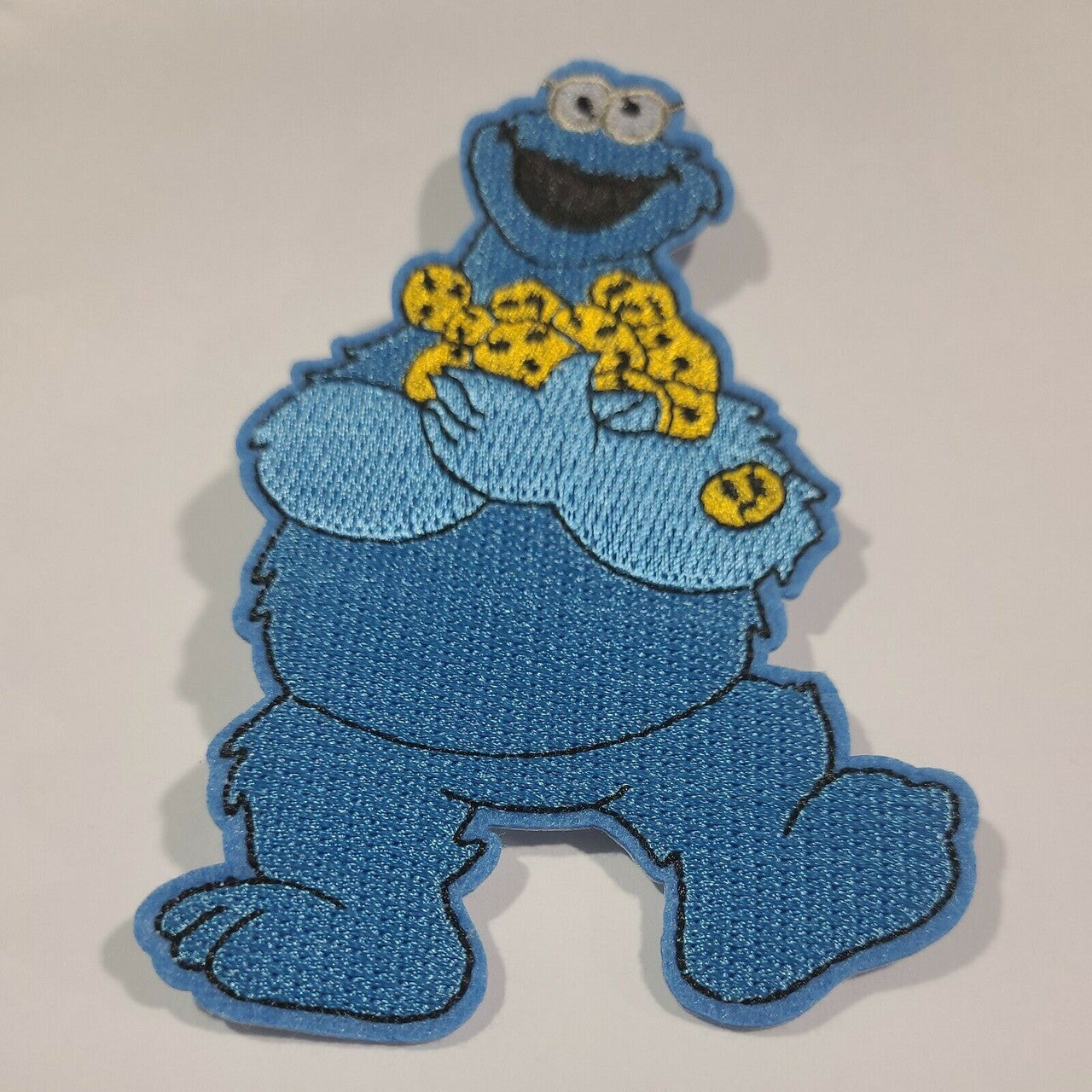 4 3/4 inches diameter, a new Sesame Street "Cookie Monsters" embroidered patch -new Sew on or Iron on.
Please note we will always combine shipping on like items. Any additional patch or pin will ship for 50 cent per item. Any additional payment will be reimbursed to your Paypal account. Thank You.