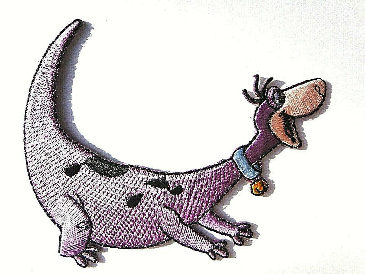 4 inches wide, a new the Flintstones "Dino" (Hanna-Barbara) embroidered patch. Sew on or iron on. New.
Please note we will always combine shipping on like items. Any additional patch or pin will ship for 50 cent per item. Any additional payment will be reimbursed to your Paypal account. Thank You.