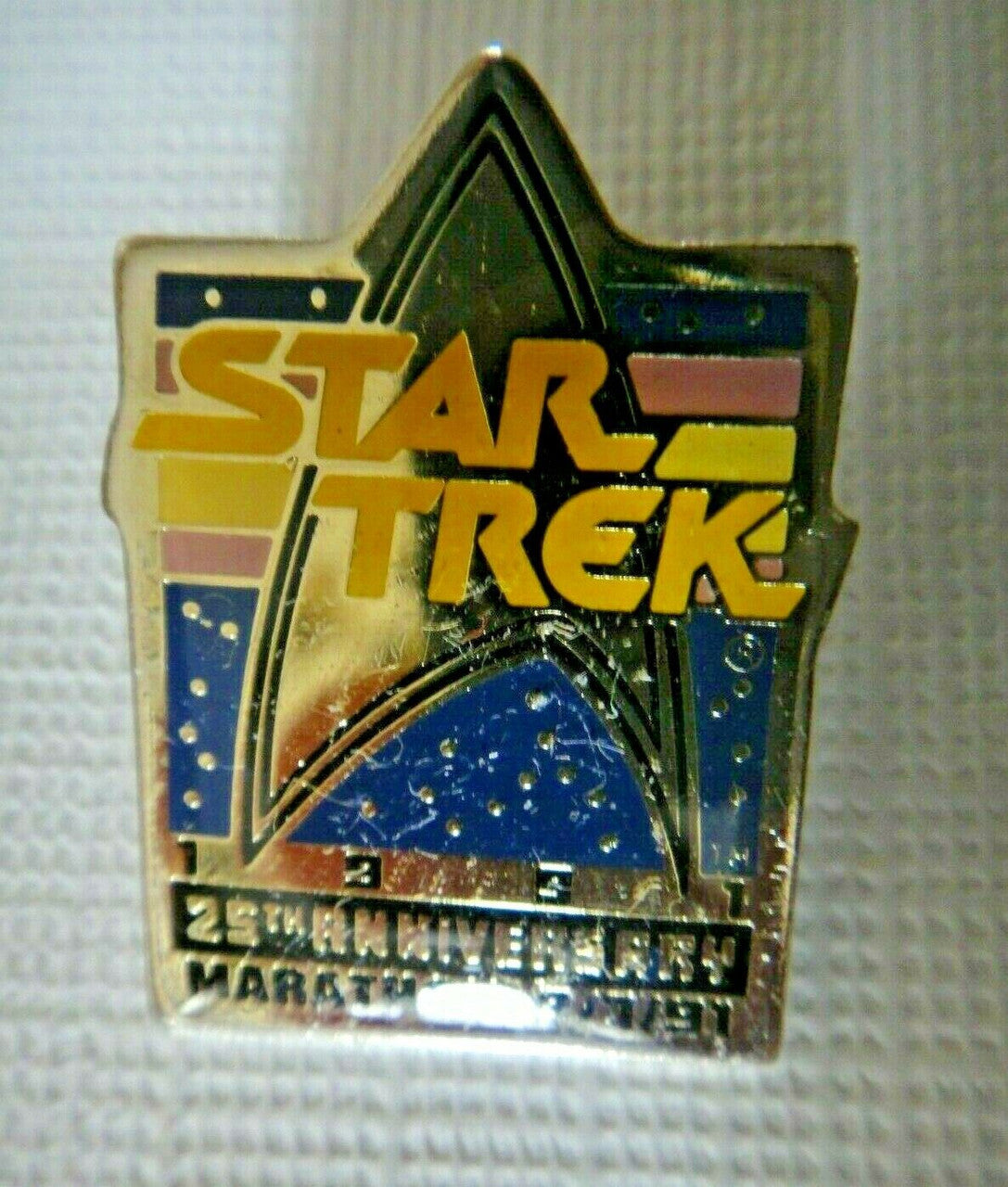 1 1/4 inch tall, Star Trek 25th Anniversary Marathon 9/7/91 Metal Enamel Pin with clutch back.
Please note we will always combine shipping on like items. Any additional patch or pin will ship for 50 cent per item. Any additional payment will be reimbursed to your Paypal account. Thank You.