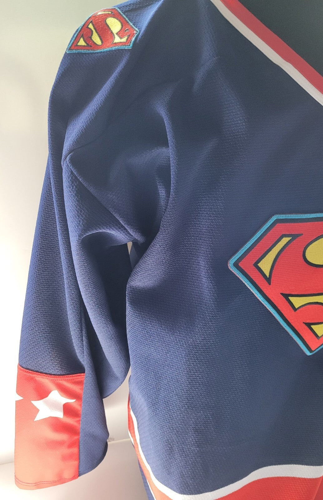 DC Comic, Superman Logo Pro Model Mens Hockey Jersey -Available in sm to 3x