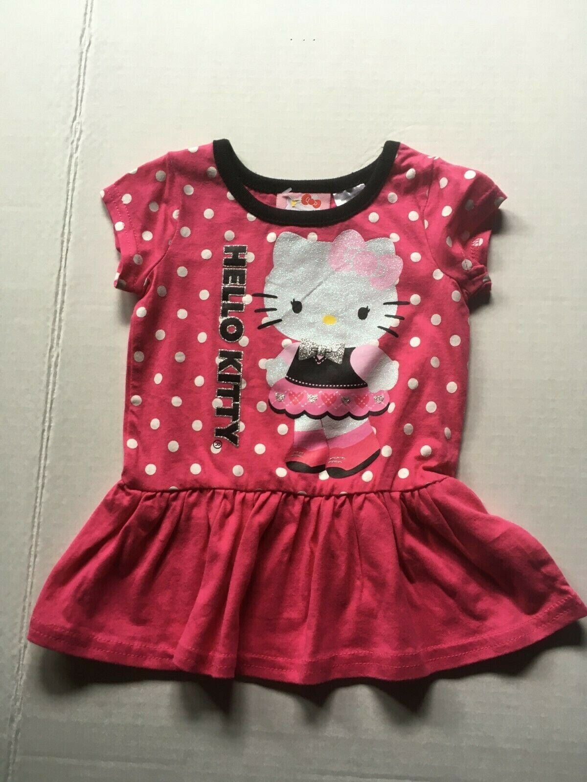 Hello Kitty  Infant ruffled polka dot  T-shirt. Size 12 months -new