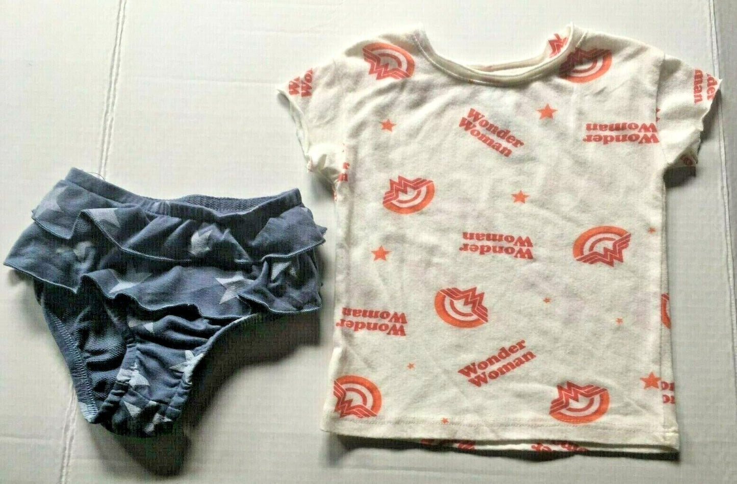 DC-Wonder Woman  2 pc set (ruffled bottom and t-shirt)  Size  12 mos & 18 mos