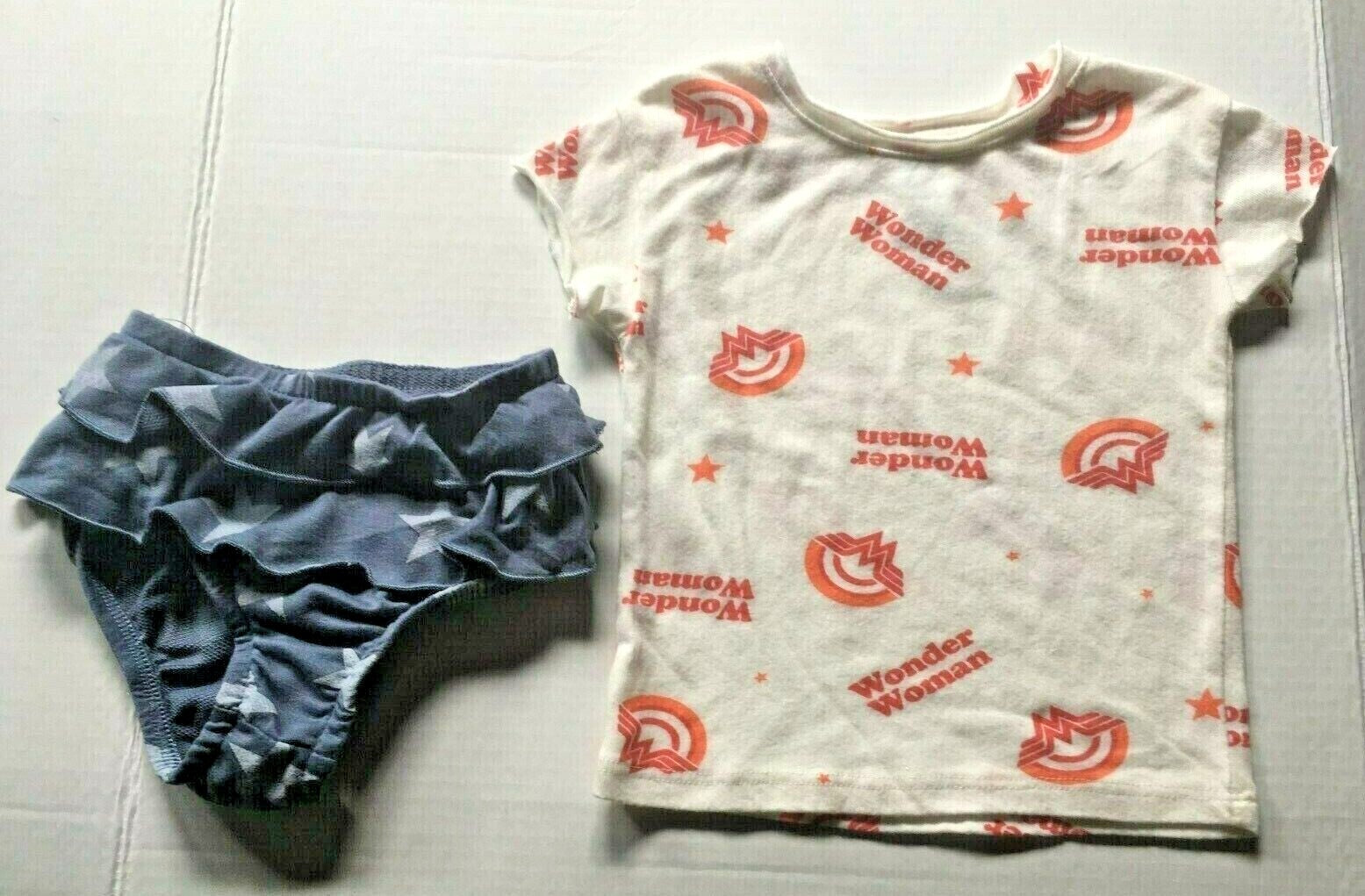 DC-Wonder Woman  2 pc set (ruffled bottom and t-shirt)  Size  12 mos & 18 mos