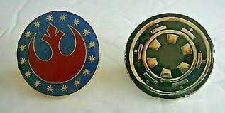 1.25 inch wide, a new Star Wars Imperial & Rebel Forces Logo enamel pins with clutch back. Two pins to the high bidder. New.

Please note we will always combine shipping on like items.  Any additional patch or pin will ship for 50 cent per item.  Any additional payment will be reimbursed to your Paypal account.  Thank You.