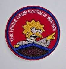 3 inches diameter, a new the Simpsons, Lisa Simpson "The whole damn system is wrong!" embroidered patch. New.
 
Please note we will always combine shipping on like items.  Any additional patch or pin will ship for 50 cent per item.  Any additional payment will be reimbursed to your Paypal account.  Thank You.