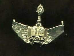 2. 1/8 inches tall,  a new  Trek: The Next Generation Klingon Bird of Prey Gold Toned Metal Pin with double pin back.  New. 

Please note we will always combine shipping on like items.  Any additional patch or pin will ship for 50 cent per item.  Any additional payment will be reimbursed to your Paypal account.  Thank You.