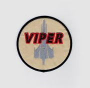 Battlestar Galactica viper pilots screen accurate embroidered patch
This is the full size patch worn on the shoulder of the Viper pilots jackets on the recent revisted hit TV show Battlestar Galactica. This is a screen accurate version down to the color and lettering. We also offer a style with a white background.