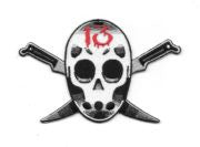 This is an approximately 5″ wide embroidered patch which features Jason’s mask over two knives from the movie “Friday The 13th”