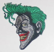 Batman animated tv show Joker smiling face embroidered patch
This is a comic art rendition of the smiling face of Batman’s nemesis the Joker copied from the animated TV series and produced many years ago. It is not an easy patch to find, and is embroidered, 3.25″ high and is in mint condition.