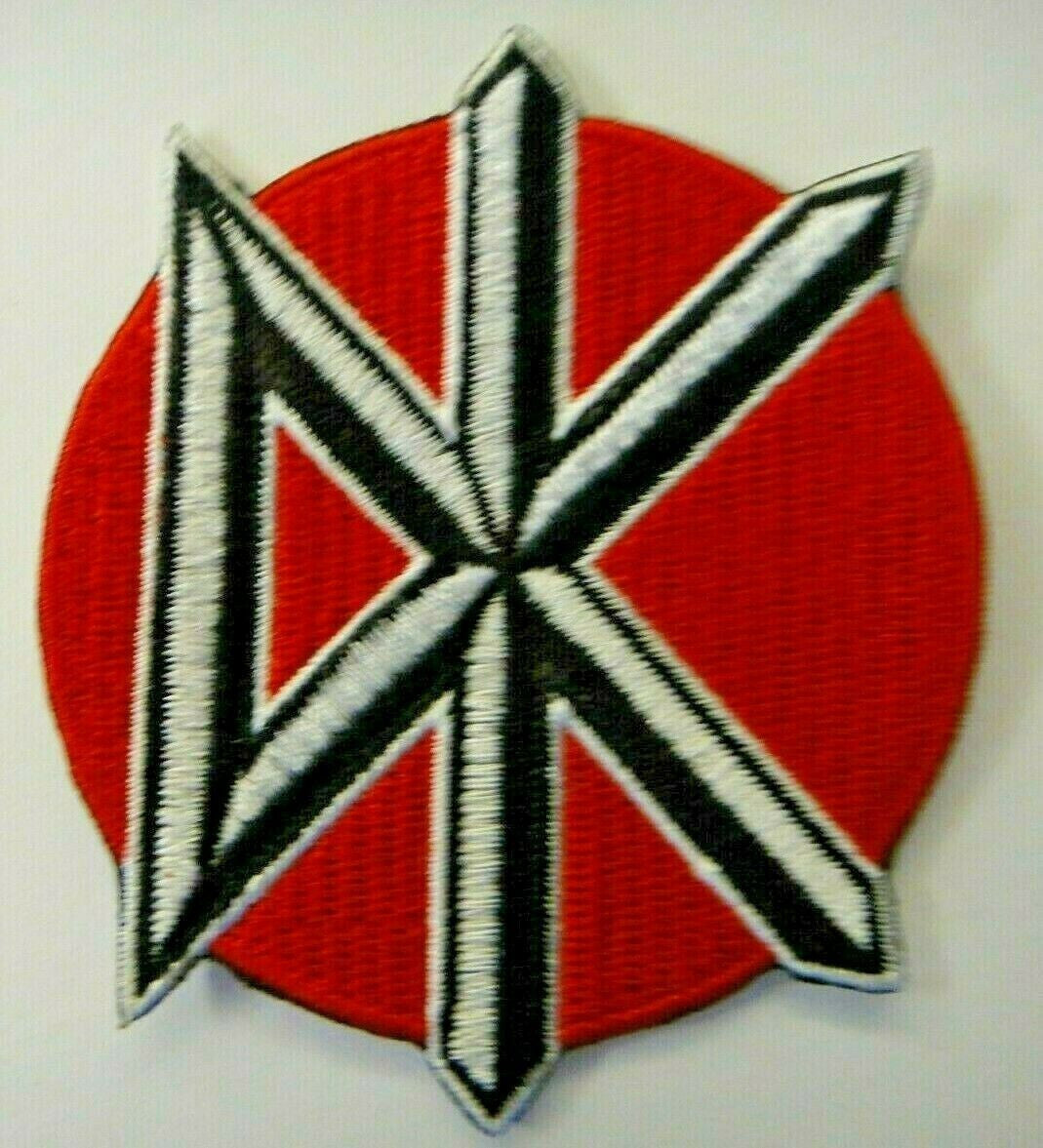 Measures 2.75 inches in diameter, a new DEAD KENNEDYS "DK" logo embroidered patch.  Sew on or Iron. 

Please note we will always combine shipping on like items.  Any additional patch or pin will ship for 50 cent per item.  Any additional payment will be reimbursed to your Paypal account.  Thank You.