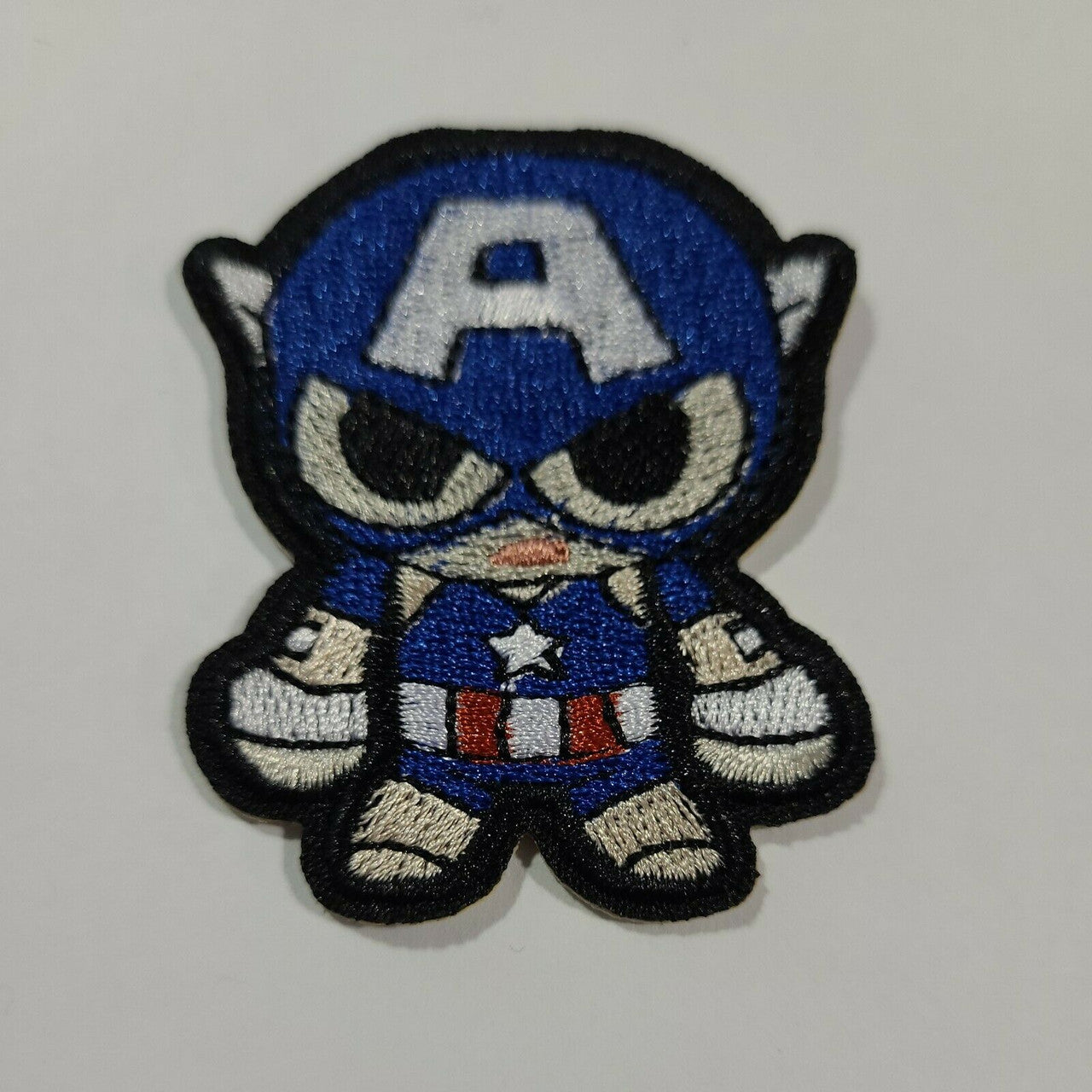 2 1/4 inches tall, a new Marvel Captain America "Chibi" embroidered patch. Sew or iron on. New.

Please note we will always combine shipping on like items.  Any additional patch or pin will ship for 50 cent per item.  Any additional payment will be reimbursed to your Paypal account.  Thank You