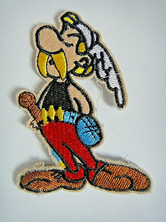 3.5 inches tall,  a new French animated character, Asterix the Gaul embroidered patch.  Sew on only.   
The patch was pulled from our patch boards taken to Comic Con.  The item was on display and glued to the board.  Some glue residue
remains.   The patch must be sewn on.  The glue back has been removed.  

Please note we will always combine shipping on like items.  Any additional patch or pin will ship for 50 cent per item.  Any additional payment will be reimbursed to your Paypal account.  Thank You.