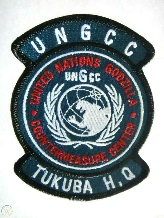 4 inches tall,  a new Godzilla "UN Godzilla Countermeasure Center" Tukuba H.Q." embroidered patch. Sew on or iron on.

Please note we will always combine shipping on like items.  Any additional patch or pin will ship for 50 cent per item.  Any additional payment will be reimbursed to your Paypal account.  Thank You.