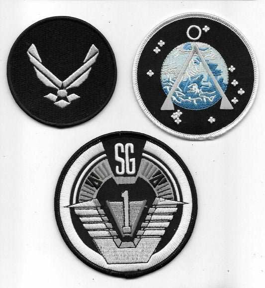 Stargate Sg-1 Uniform Embrodiered Patch Set. Sew on or iron on. New.  
1. Sg-1 shoulder patch, 2. USAF arm patch & 3. SG-Earth Project patch.  The auction includes all 3 patches shown in the photo.  

Please note we will always combine shipping on like items.  Any additional patch or pin will ship for 50 cent per item.  Any additional payment will be reimbursed to your Paypal account.  Thank You.