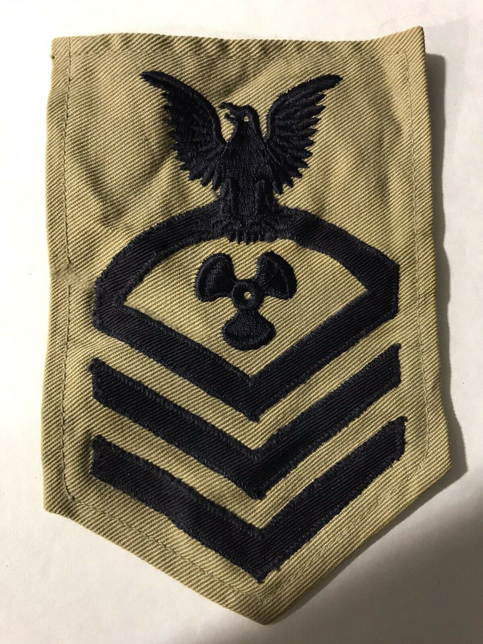 6 inches tall, a well cared for WWII Navy Mate, Chief Petty Officer -CPO- Machinist Mate khaki embroidered twill  patch. Sew on only. New.

Please note we will always combine shipping on like items.  Any additional patch or pin will ship for 50 cent per item.  Any additional payment will be reimbursed to your Paypal account.  Thank You.