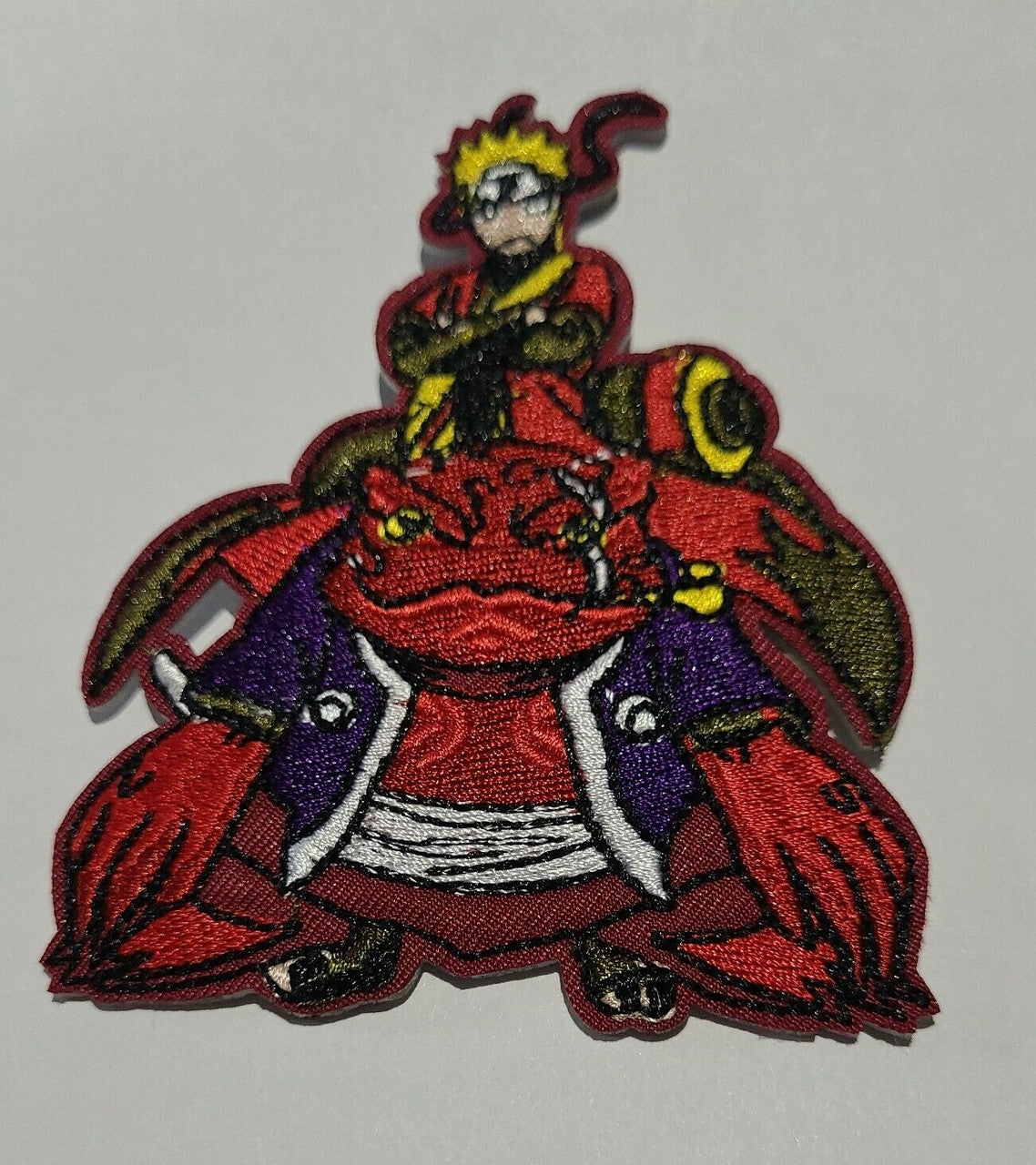 2.5 inches diameter, a new Naruto & Gamakichi embroidered patch,  Sew on or iron. New.

Please note we will always combine shipping on like items.  Any additional patch or pin will ship for 50 cent per item.  Any additional payment will be reimbursed to your Paypal account.  Thank You.