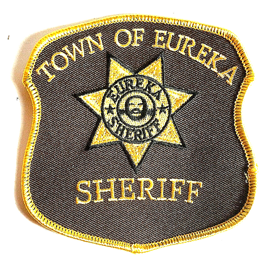 4 inches square, a new Eureka TV Series "Town or Eureka" Sheriff Shoulder Embroidered Patch. Sew or iron on. New.

Please note we will always combine shipping on like items.  Any additional patch or pin will ship for 50 cent per item.  Any additional payment will be reimbursed to your Paypal account.  Thank You.