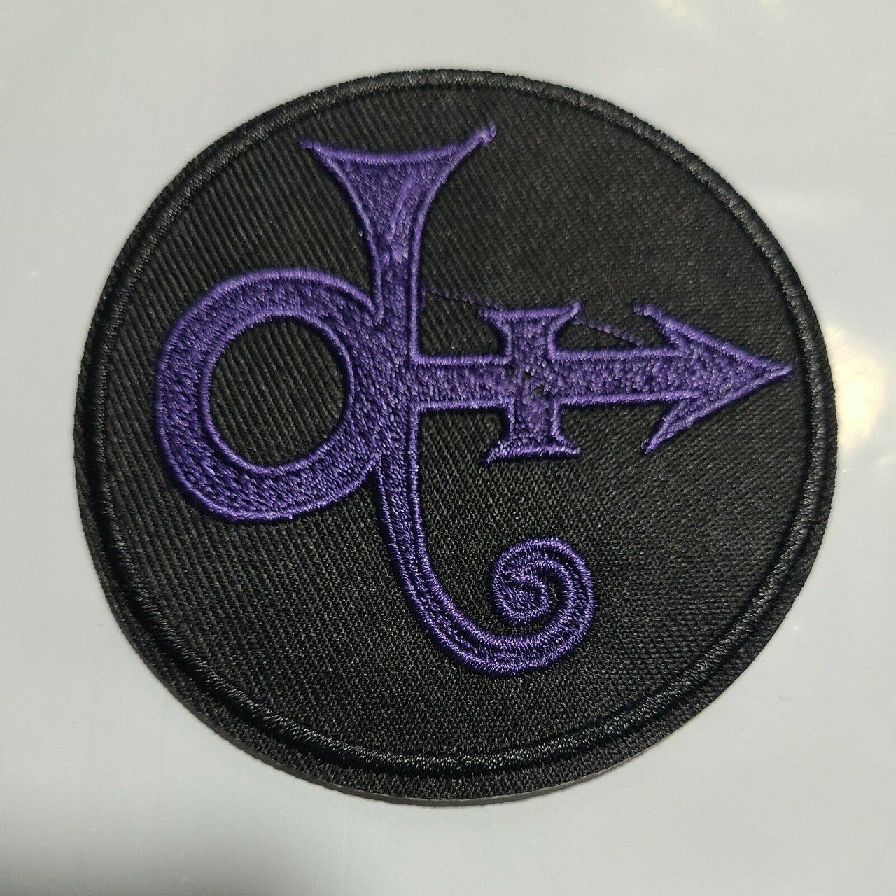 3 1/4 inches wide, a new Prince Guitar Logo embroidered patch. Sew on or iron on. New.

Please note we will always combine shipping on like items.  Any additional patch or pin will ship for 50 cent per item.  Any additional payment will be reimbursed to your Paypal account.  Thank You.