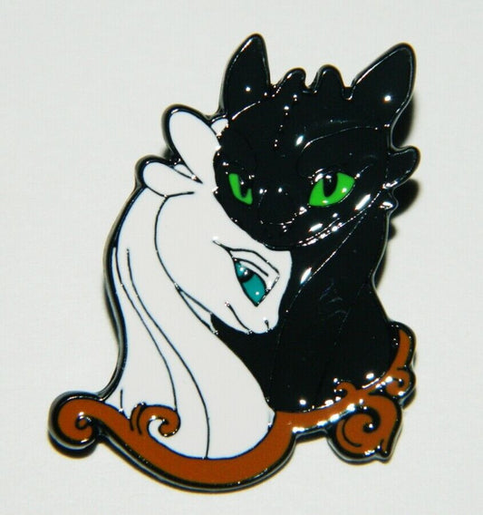 1. 3/8 inch wise,  How To Train Your Dragon "Light Fury and Toothless" Enamel Pin with clutch back.

Please note we will always combine shipping on like items.  Any additional patch or pin will ship for 50 cent per item.  Any additional payment will be reimbursed to your Paypal account.  Thank You.
