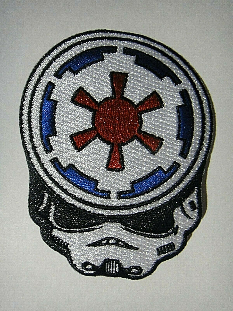 3.5 inches tall, a new Star Wars "Grateful Dead Trooper" embroidered patch. Sew on or iron on. New.

Please note we will always combine shipping on like items.  Any additional patch or pin will ship for 50 cent per item.  Any additional payment will be reimbursed to your Paypal account.  Thank You.