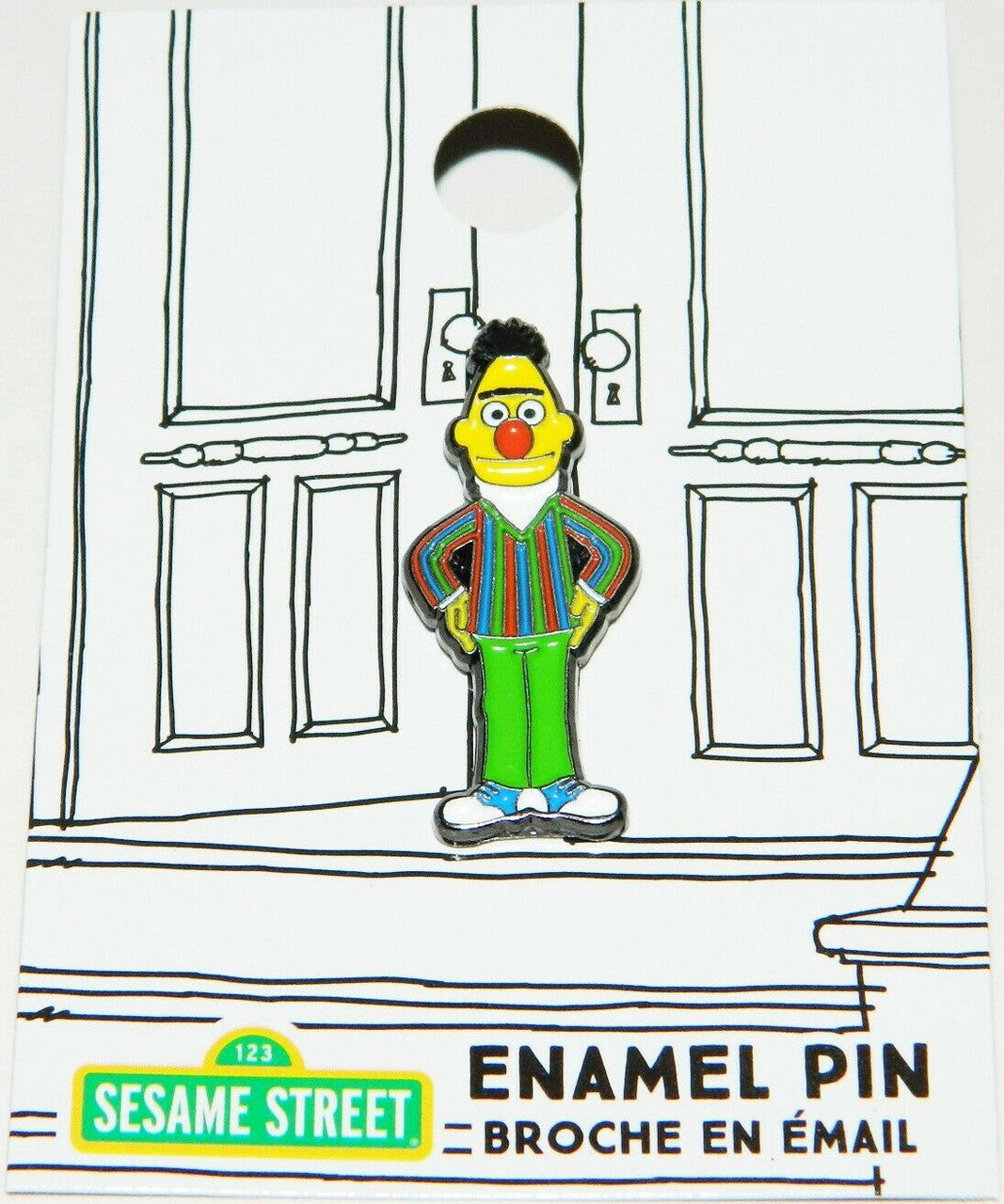 1 inch tall,  Sesame Street, "Bert" of Bert and Ernie Enamel Pin with clutch back, new   

Please note we will always combine shipping on like items.  Any additional patch or pin will ship for 50 cent per item.  Any additional payment will be reimbursed to your Paypal account.  Thank You.
