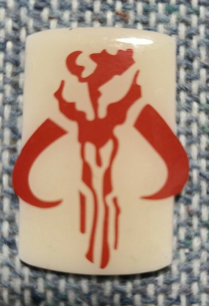 1. 3/8 inch high, Star Wars Boba Fett Embossed Mandalorian logo lapel size enamel pin with clutch back. New.

Please note we will always combine shipping on like items.  Any additional patch or pin will ship for 50 cent per item.  Any additional payment will be reimbursed to your Paypal account.  Thank You.