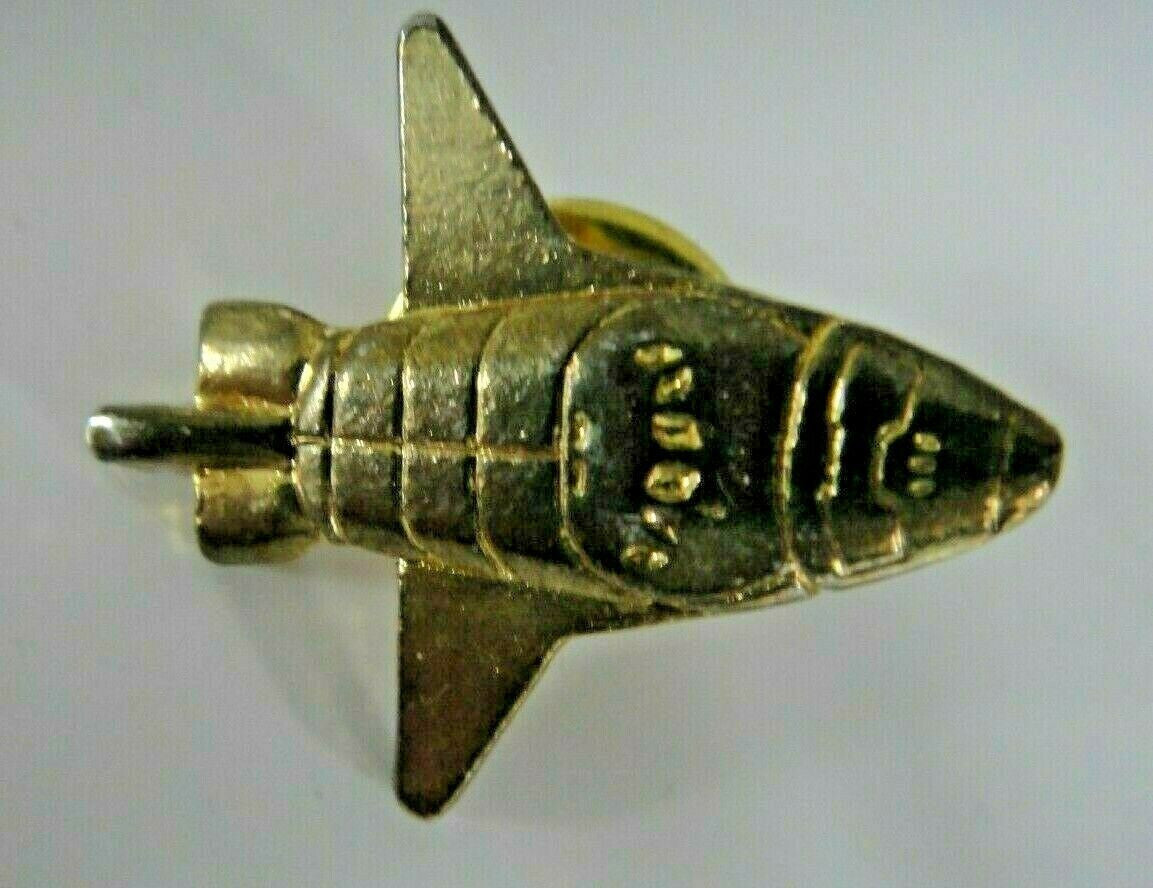 1 inches wide, a new Space Shuttle Metal 3-D lapel Pin with clutch back. 

Please note we will always combine shipping on like items.  Any additional patch or pin will ship for 50 cent per item.  Any additional payment will be reimbursed to your Paypal account.  Thank You.
