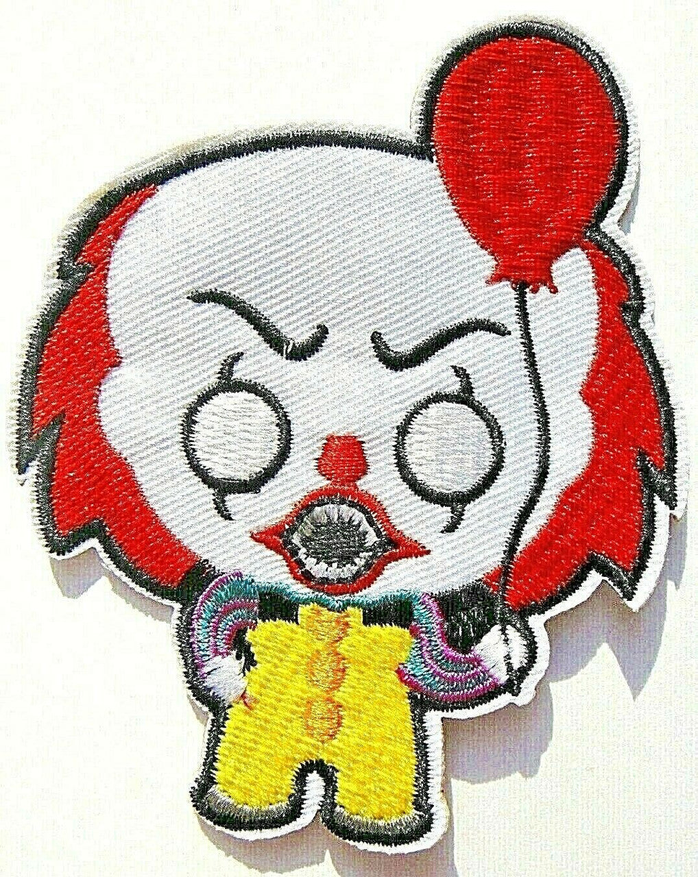 4 inches tall,  a new Pennywise Cartoon with Balloon "IT" embroidered patch. Sew on or iron on.

Please note we will always combine shipping on like items.  Any additional patch or pin will ship for 50 cent per item.  Any additional payment will be reimbursed to your Paypal account.  Thank You.
