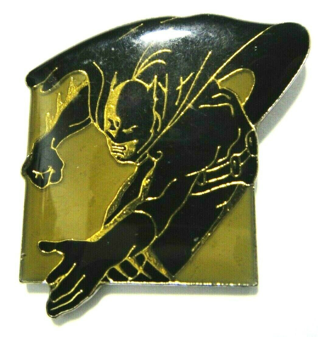 1.25 inches tall,  Batman "Jumps into the Action" Enamel Lapel Pin with clutch back. New.

Please note we will always combine shipping on like items.  Any additional patch or pin will ship for 50 cent per item.  Any additional payment will be reimbursed to your Paypal account.  Thank You.
