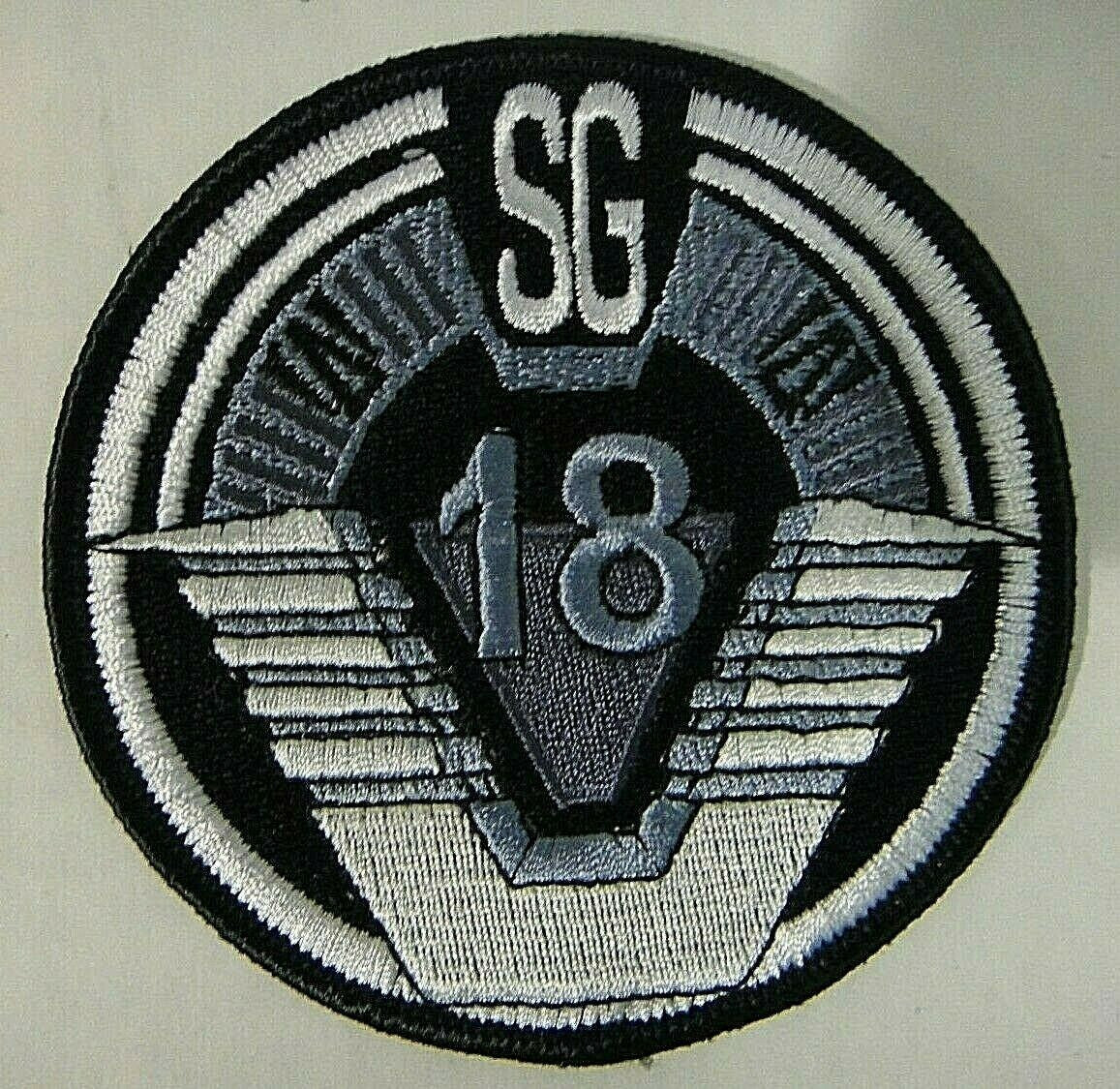4" diameter, a new Stargate SG-18 Logo jacket patch. Sew or iron on. New. 

Please note we will always combine shipping on like items.  Any additional patch or pin will ship for 50 cent per item.  Any additional payment will be reimbursed to your Paypal account.  Thank You.