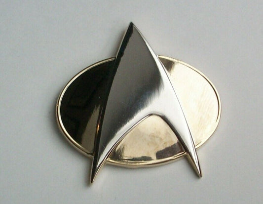 1. 3/4" x 2 inches tall,  a new Star Trek The Next Generation full-size uniform cloisonne pin with single clutch back. This pin is a similar version of that worn on the TNG uniforms.   New.

Please note we will always combine shipping on like items.  Any additional patch or pin will ship for 75 cent per item.  Any additional payment will be reimbursed to your Paypal account.  Thank You.