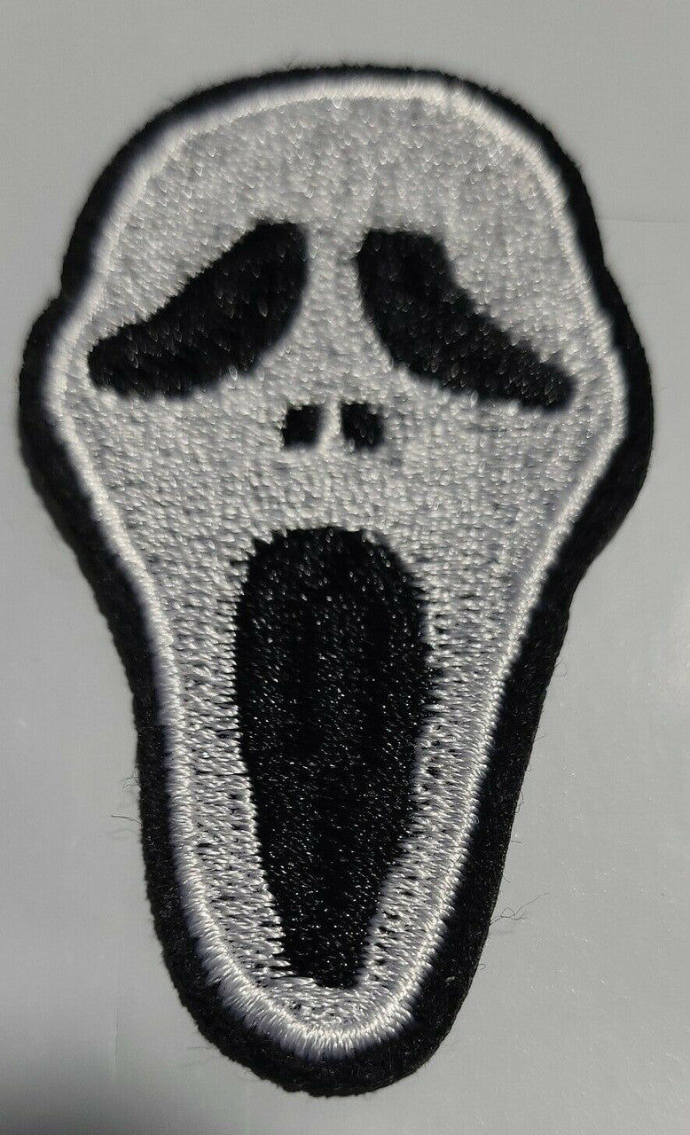 3.5 inches wide, a new Scream "Ghost Face" Silhouette Embroidered Patch. Sew or iron on. New.

Please note we will always combine shipping on like items.  Any additional patch or pin will ship for 50 cent per item.  Any additional payment will be reimbursed to your Paypal account.  Thank You.
