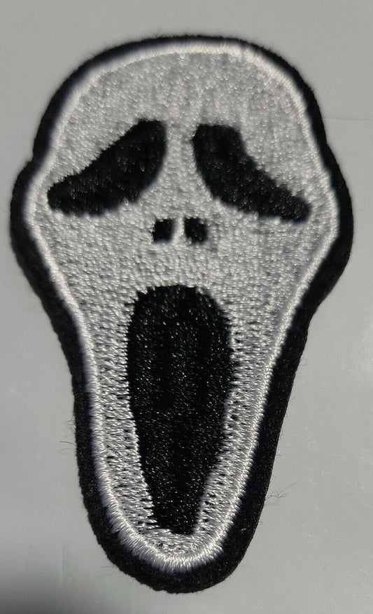 3.5 inches wide, a new Scream "Ghost Face" Silhouette Embroidered Patch. Sew or iron on. New.

Please note we will always combine shipping on like items.  Any additional patch or pin will ship for 50 cent per item.  Any additional payment will be reimbursed to your Paypal account.  Thank You.