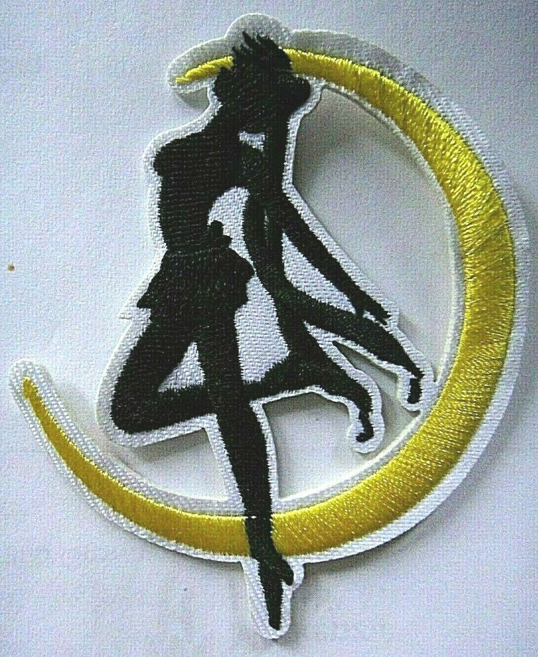 3 inches tall,  a new Sailor Moon "Usagi Tsukino" Over the Moon embroidered patch.  Sew or iron on. New. 

Please note we will always combine shipping on like items.  Any additional patch or pin will ship for 50 cent per item.  Any additional payment will be reimbursed to your Paypal account.  Thank You.