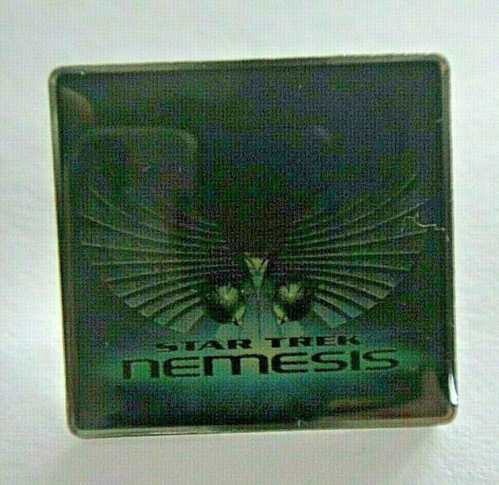New Star Trek "Nemesis" Motion Picture Movie Poster Enamel Pin.  Measure 1 inch wide.  Includes a clutch back.  

Please note we will always combine shipping on like items.  Any additional patch or pin will ship for 50 cent per item.  Any additional payment will be reimbursed to your Paypal account.  Thank You.