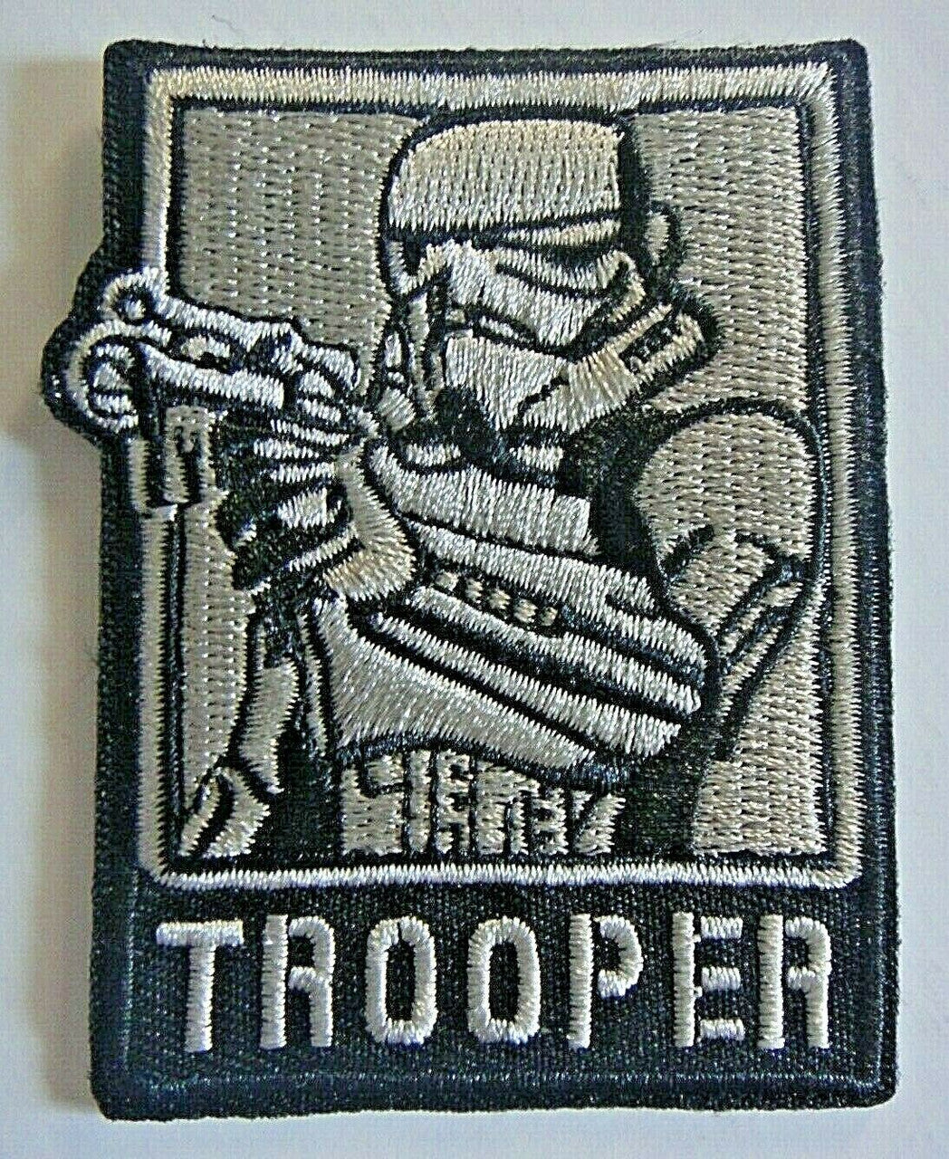3. 1/4 inches tall,  a new Star Wars Stormtrooper  "TROOPER"  embroidered patch. Sew on or iron on.

Please note we will always combine shipping on like items.  Any additional patch or pin will ship for 50 cent per item.  Any additional payment will be reimbursed to your Paypal account.  Thank You.