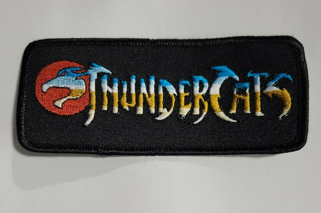 4 3/4 inches long, a new Thundercats embroidered patch. Sew or iron on. New.

Please note we will always combine shipping on like items. Any additional patch or pin will ship for 50 cent per item. Any additional payment will be reimbursed to your Paypal account. Thank You.