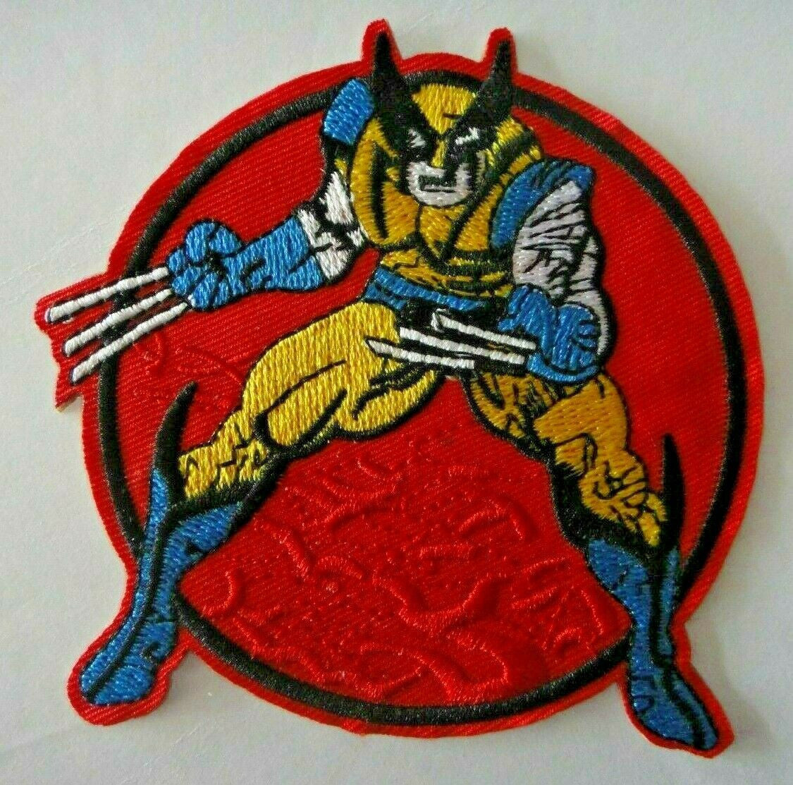 3 1/2 inches wide,  a new Wolverine "Battle Pose" (the Uncanny X-Men) Embroidered Patch -new
Sew on or iron. 

Please note we will always combine shipping on like items.  Any additional patch or pin will ship for 50 cent per item.  Any additional payment will be reimbursed to your Paypal account.  Thank You.