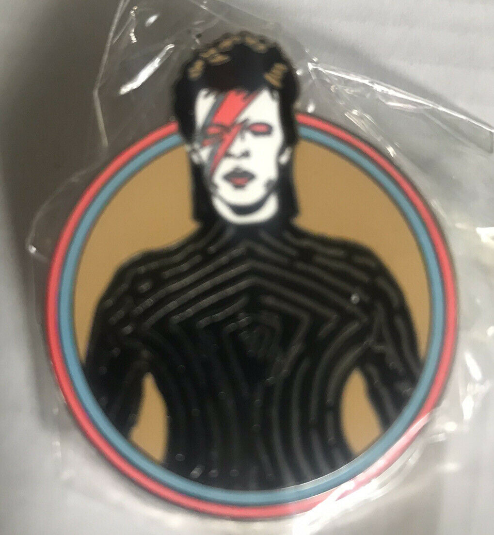 1. 3/4 inches tall,  a new David Bowie, "Ziggy Stardust" enamel pin with a post and butterfly back.

Please note we will always combine shipping on like items.  Any additional patch or pin will ship for 50 cent per item.  Any additional payment will be reimbursed to your Paypal account.  Thank You.