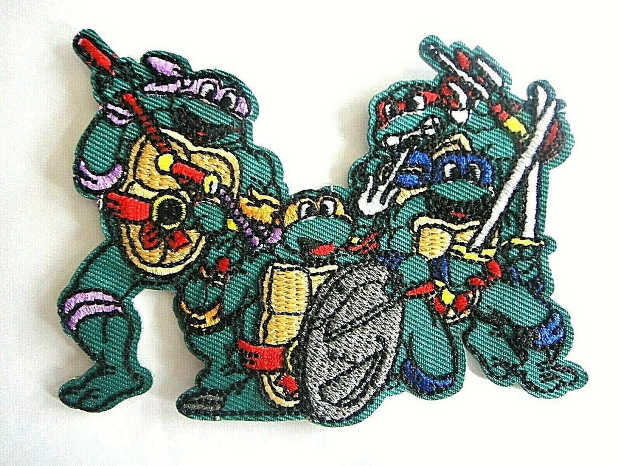 3 1/2  inches tall,  a new Teenage Mutant Ninja Turtles "4 in the Sewer" x-Large embroidered patch.  Sew or iron on. New. 

Please note we will always combine shipping on like items.  Any additional patch or pin will ship for 50 cent per item.  Any additional payment will be reimbursed to your Paypal account.  Thank You.