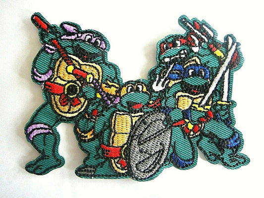 3 1/2  inches tall,  a new Teenage Mutant Ninja Turtles "4 in the Sewer" x-Large embroidered patch.  Sew or iron on. New. 

Please note we will always combine shipping on like items.  Any additional patch or pin will ship for 50 cent per item.  Any additional payment will be reimbursed to your Paypal account.  Thank You.
