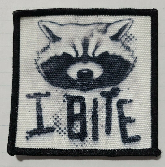 3 inches square.   A new Marvel comic series "Guardians of the Galaxy" Rocket Raccoon, "I Bite"  embroidered patch. Sew on or iron.

Please note we will always combine shipping on like items.  Any additional patch or pin will ship for 50 cent per item.  Any additional payment will be reimbursed to your Paypal account.  Thank You.