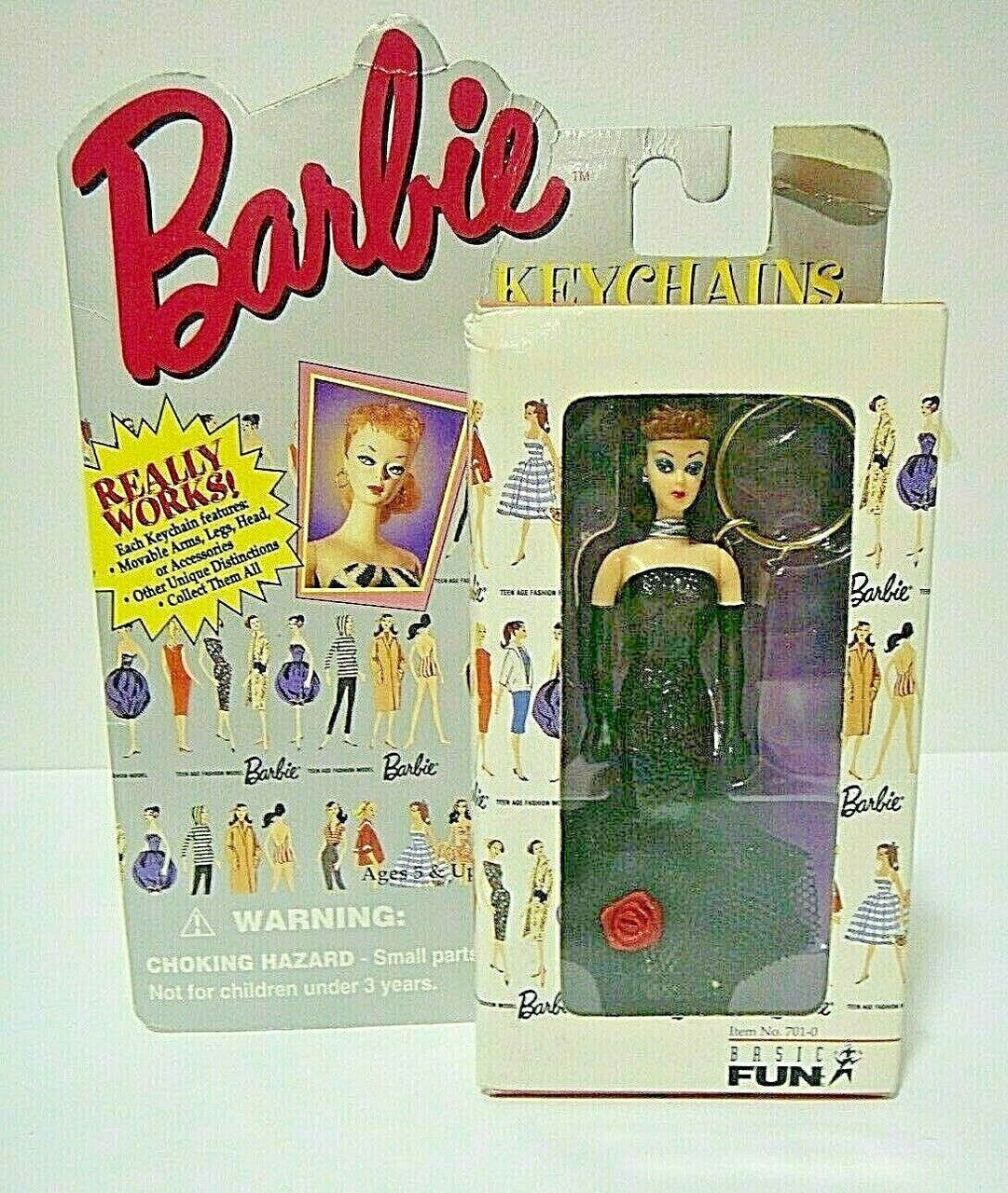 New Barbie Poseable Doll Keychain "Solo in the Spotlight by Basic Fun. 1995.  The arms and kegs and head can be moved replica doll is adorned with accents of the golden era of Barbie.  The replica has brunette hair as the dolls varied. 

Please note we will always combine shipping on like items.  Any additional patch or pin will ship for 50 cent per item.  Any additional payment will be reimbursed to your Paypal account.  Thank You.