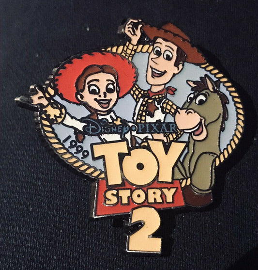 1.75 inches wide. a new Toy Story "Jessie, Woody & Bullseye" enamel pin with single post clutch back.  New.

Please note we will always combine shipping on like items.  Any additional patch or pin will ship for 50 cent per item.  Any additional payment will be reimbursed to your Paypal account.  Thank You.