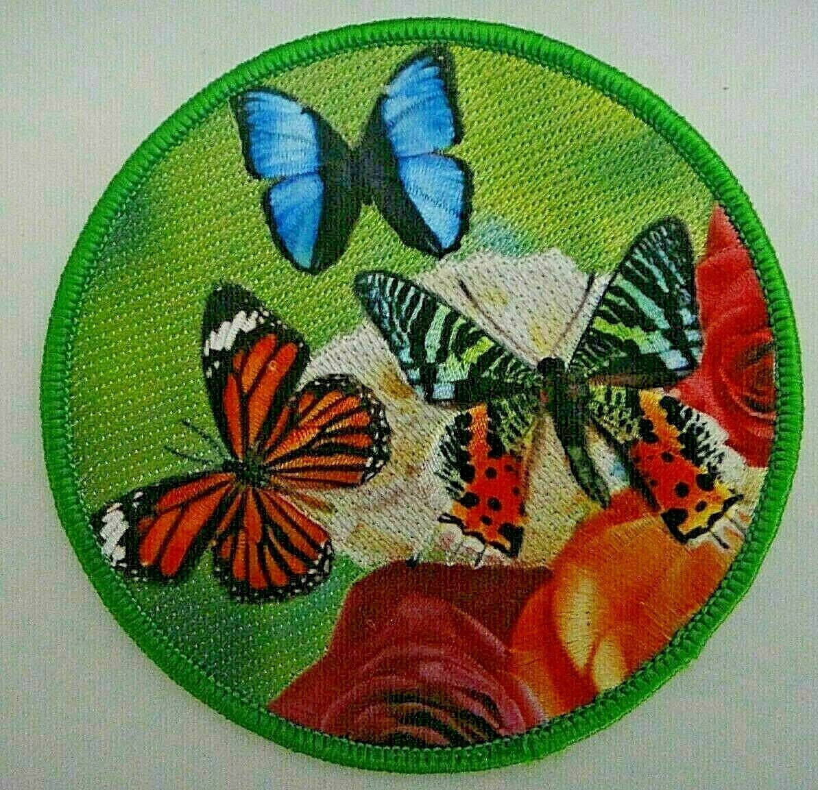 4 inches tall,  a new Butterflies and Roses embroidered patch.  Sew or iron on. New. 

Please note we will always combine shipping on like items.  Any additional patch or pin will ship for 50 cent per item.  Any additional payment will be reimbursed to your Paypal account.  Thank You.