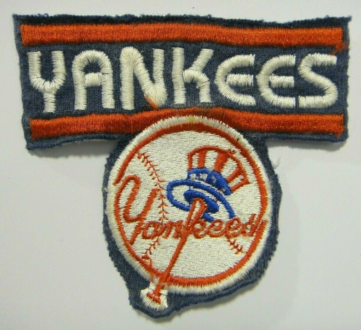 3" inches wide, a like new New York Yankees "Hat and Bat" Logo embroidered patch from a shirt or jacket. Sew on only. New old stock found at a recent estate sale.  Roughly from the 1980s or 1980s.  A very nice piece.

Please note we will always combine shipping on like items.  Any additional patch or pin will ship for 50 cent per item.  Any additional payment will be reimbursed to your Paypal account.  Thank You.