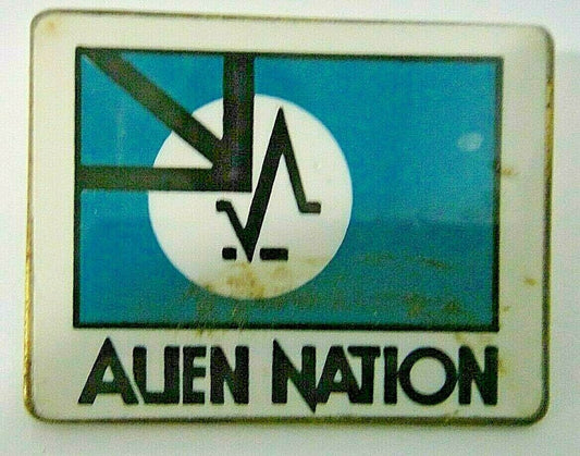 1 1/4 inches wide.  a new Alien Nation 1998 Motion Picture Enamel Metal pin with clutch back. 

Please note we will always combine shipping on like items.  Any additional patch or pin will ship for 50 cent per item.  Any additional payment will be reimbursed to your Paypal account.  Thank You.